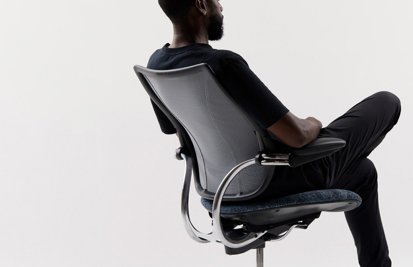 Person leaning back in Liberty chair